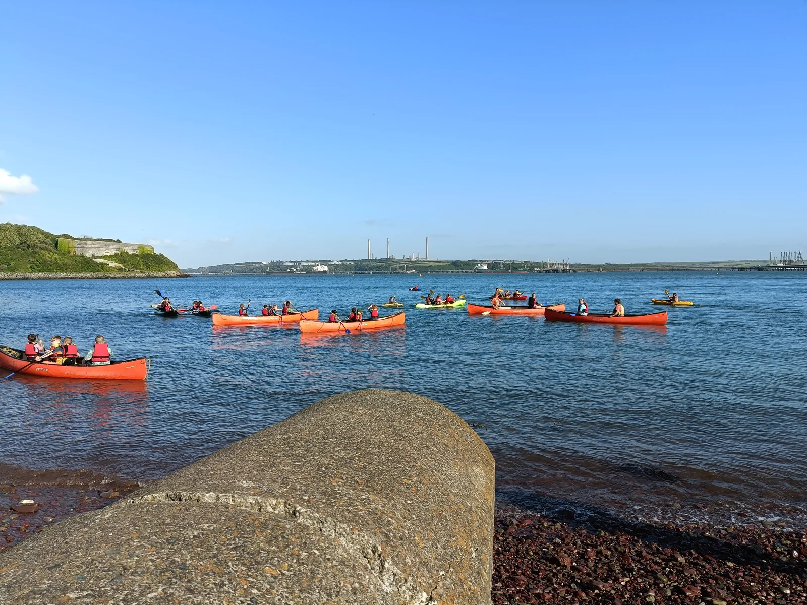 A group of kayakers out on the water